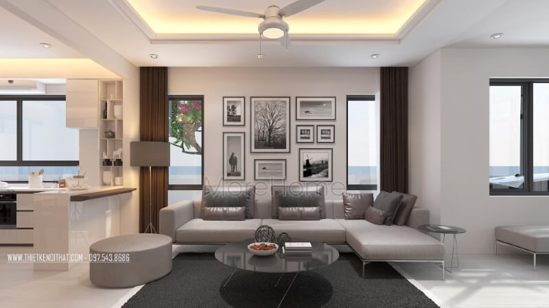 Trang trí nội thất phòng khách hiện đại với tone trầm chủ đạo tạo nên không gian nhẹ nhàng, sâu lắng tại biệt thự Vinhomes Thăng Long Hà Nội. Thiết kế phòng khách biệt thự